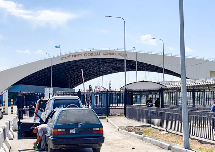 Crossing the Border from Kazakhstan to Kyrgyzstan at Korday