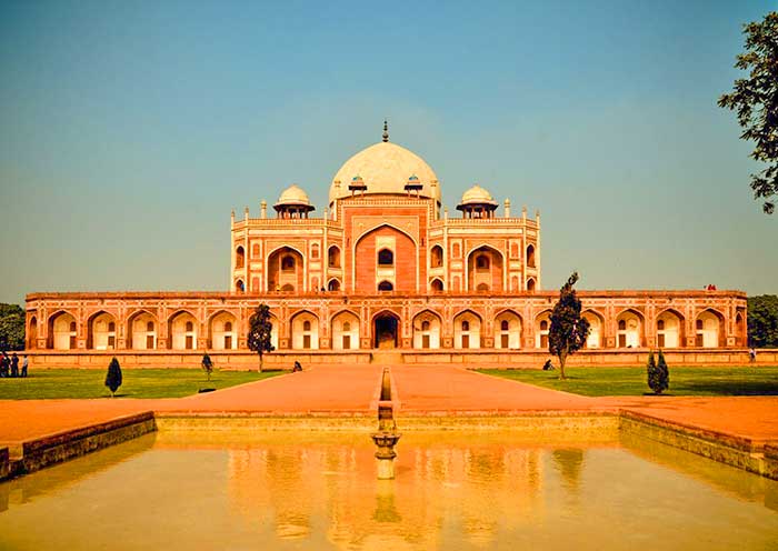 The main tomb structure is made of red sandstone