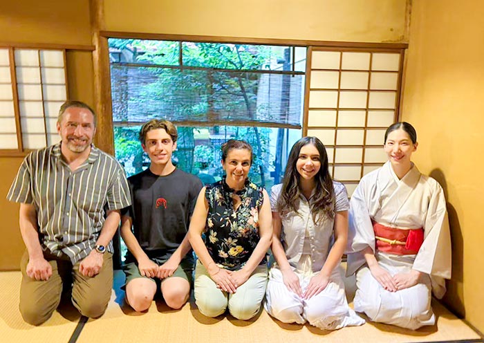 Guests taking part in a Japanese tea ceremony