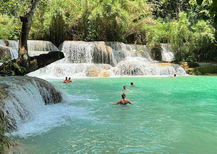 Swim in pool of Kuang Si Waterfalls