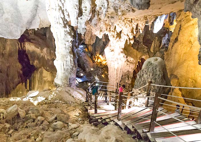 Visit Lang Cave with wonderful limeston stalagmites 