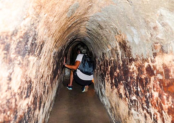 Crawl through a short section of the Cu Chi Tunnels