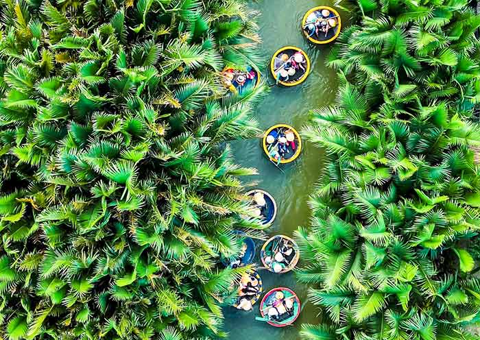 Round bamboo boats, bobbing on the water
