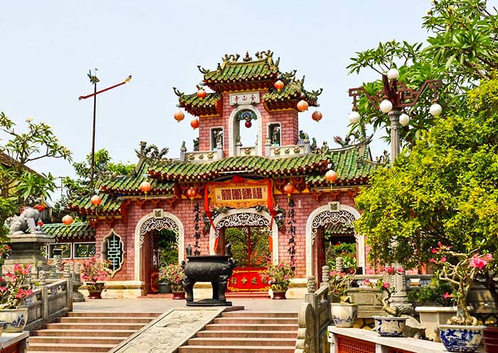 Intricate carvings and vibrant murals adorn the walls