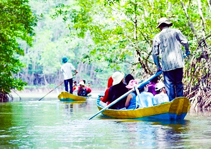 Glide through emerald canals on a Mekong Delta cruise