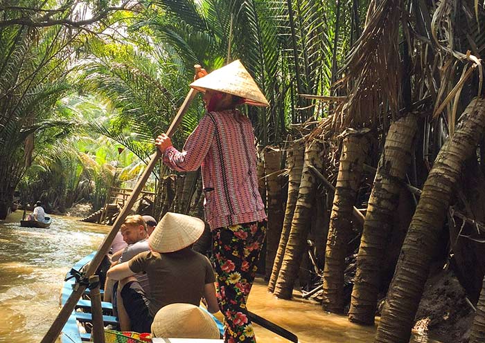 Hand-paddled boat ride through hidden canals