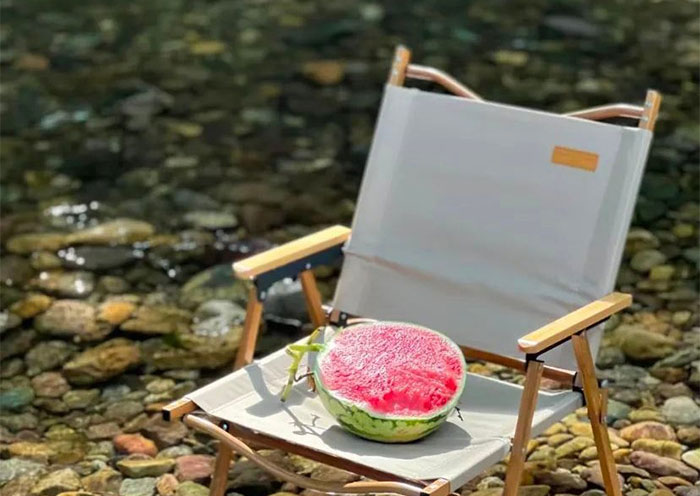 Eating watermelon in the stream at Longhuxia Canyon