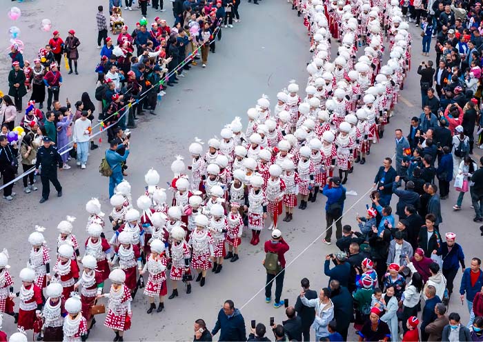 Thousands of Miao People Parade in Traditional Costumes