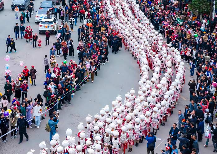 Thousands of Miao People Parade in Traditional Costumes