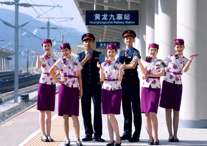 Attendants at Huanglongjiuzhai Railway Station
