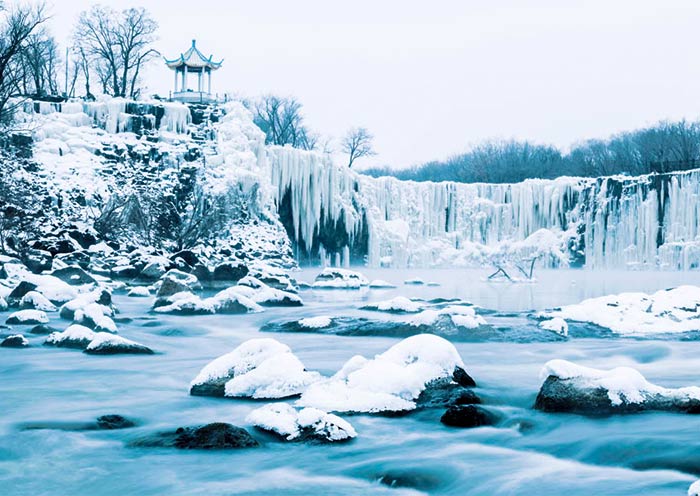 Diaoshuilou Waterfall at Jingpo Lake during winter