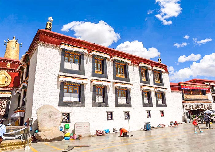 Praying in front of Jokhang Temple Lhasa Jokhang Temple