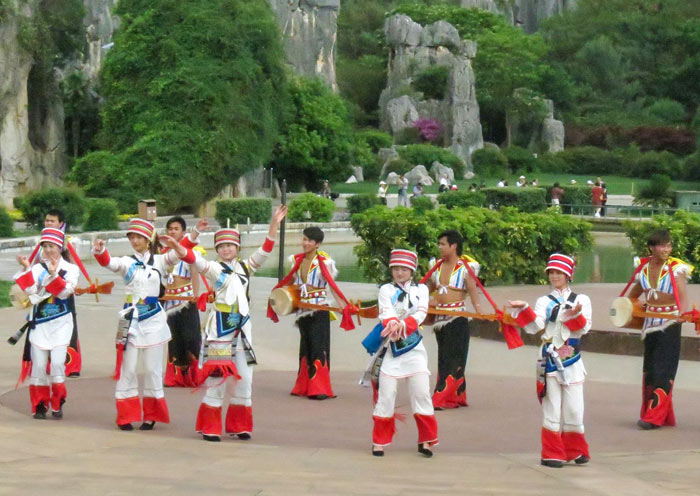 Yi Minority People dance in Stone Forest