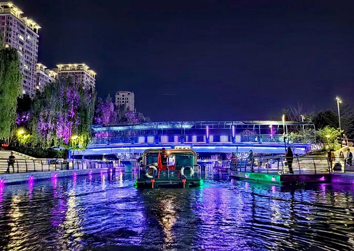 Enjoy a leisurely night cruise on Beijing's Liangma River