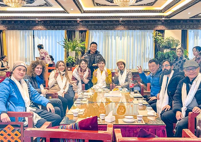 Our Guests Enjoying a Traditional Tibetan Meal