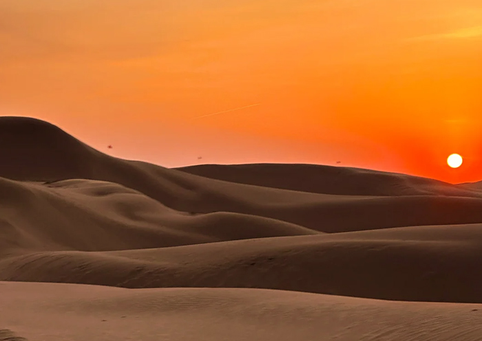 Enjoy the sunset or sunrise at Kubuqi's Sounding Sand Bay