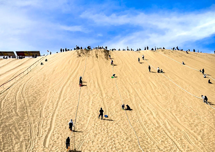 Sand slide at Kubuqi's Sounding Sand Bay