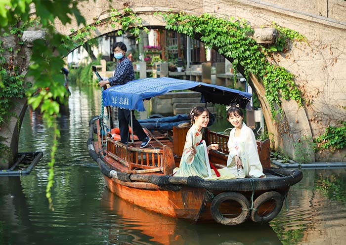 Cruise and relax on the boat when exploring Zhouzhuang