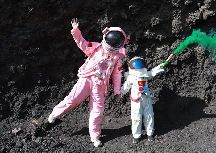 Cosplay astronauts at Wulanhada Volcanic Cluster