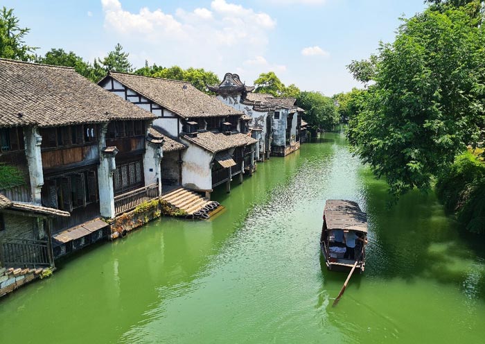 Famous ancient water town near Shanghai referred to as the "Land of Fish and Rice" and the "Silk Capital."