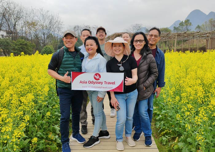 Our guests in Yangshuo during rapeseed bloom Our guests in Yangshuo during rapeseed bloom