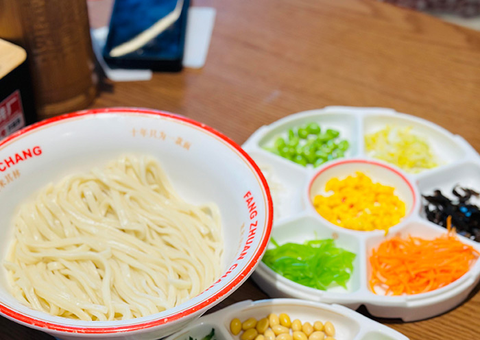 Savor Zhajiangmian in Beijing, a classic and flavorful noodle dish