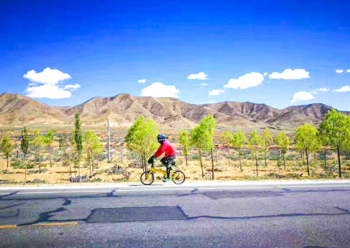 Cycling on the road, Tibet Bike Tour